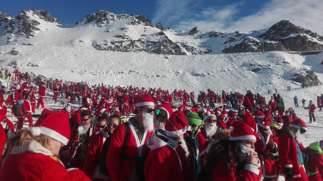 In pictures: 1,200 Santa Claus ski in Verbier
