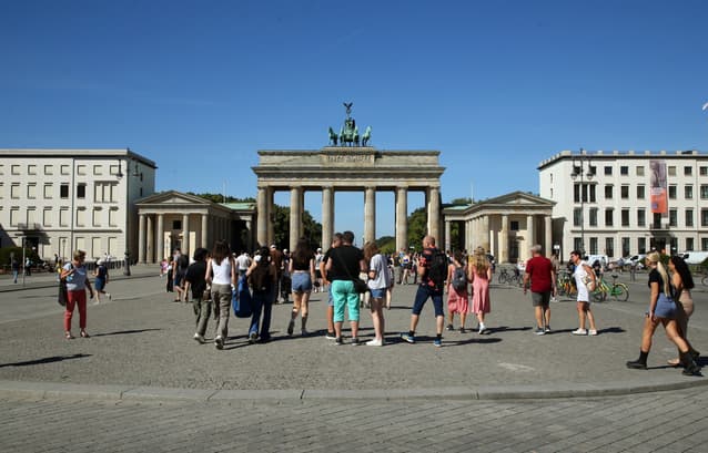 Tell us: What's your experience of applying for permanent residency in Germany?
