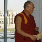 Merkel welcomes China’s offer to talk with Tibet