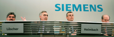 Scandal-hit Siemens sees Q2 profit cut by two-thirds