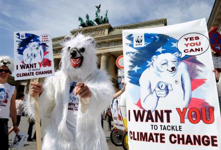 Activists from environmental protection organisation WWF encourage Barack Obama to fight against climate change. Photo: DPA