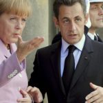 Merkel confers with Sarkozy and Bush over crisis
