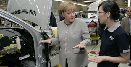 Merkel warns of hard economic times ahead