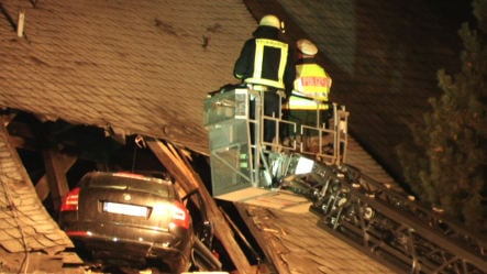 Speeding car launches into church roof