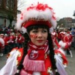 Karneval revellers brave chilly rain for Rosenmontag parade