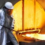 Steel production drops by half