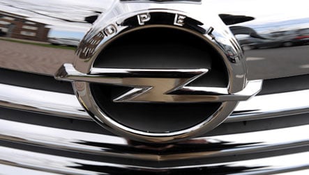 Opel cuts executive pay