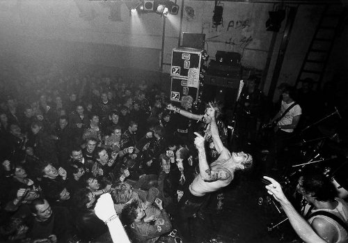 Henry Rollins leads Black Flag during an SO show, February 1983. Rollins is now a well-known solo and spoken word artist, and wrote a chronicle of this time with his pioneering SST-label band called Get in the Van. Photo: Peter Gruchot
