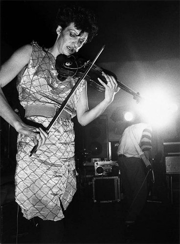Margita Haberland, singer and violinist for Abwärts, onstage in April 1981. Haberland, who grew up in Berlin and in Austria, is a performance artist and actress. She once briefly lived in a group flat with Gudrun Ensslin (who went on to be one of the members of the Baader-Meinhof gang) and had a hand in the free jazz scene of the early 70s. Photo: Mark Eins