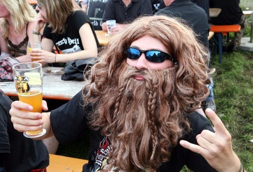 This fan is ready to rock with his viking beard. Photo: DPA