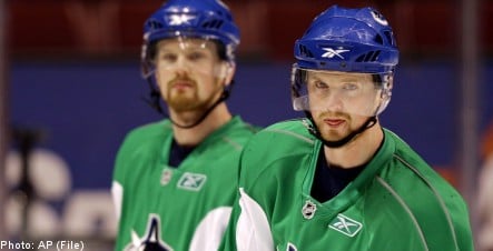 Sedin brothers ink deal to remain in Vancouver