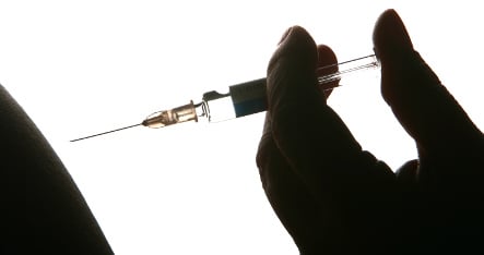 Health insurers bashed for vaccine threats