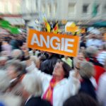 Flash mob greets Merkel at Hamburg rally