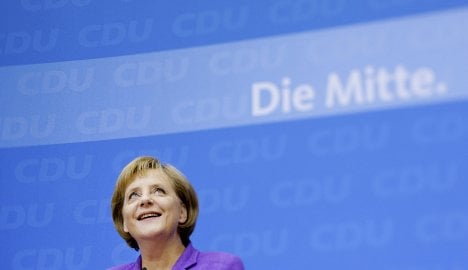 Merkel warns Germans of challenges ahead