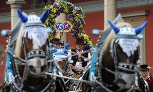 The Oktoberfest hosts a seven-kilometre-long traditional costume parade, complete with horse-drawn coaches.Photo: DPA