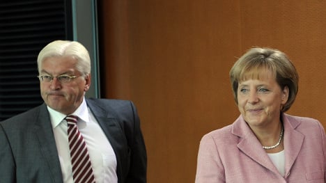 Merkel ahead in polls as election battle heats up