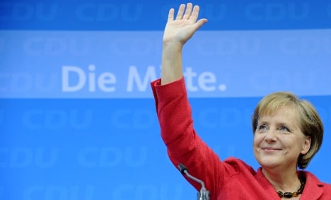 Merkel's conservatives win with FDP: exit polls