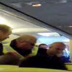 Boxers pin passenger in mid-air scare