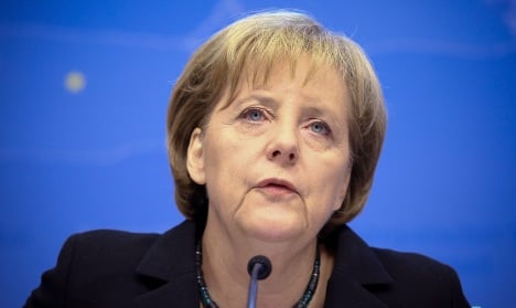 Merkel says climate talks 'not looking promising'