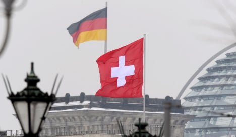Swiss MP threatens fire with fire over bank data
