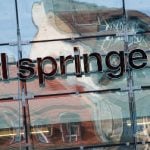 Axel Springer merges eastern holdings with Swiss group