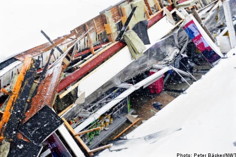 Supermarket roof caves in under weight of snow