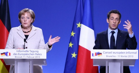 Merkel pushes IMF plan for Greece
