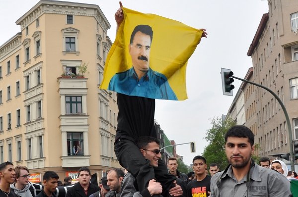 A protester carried a flag featuring Abdullah Öcalan, a jailed Kurdish leader.Photo: Julia Lipkins