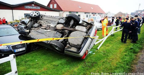 'Lynch mob atmosphere' as car somersaults onto luxury vehicles