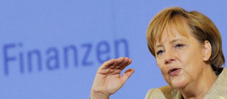 Merkel pushes for new global financial rules