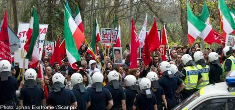 Protestors try to storm Iranian Embassy