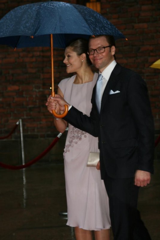 The Crown Princess and Daniel Westling - who will presumably be hoping for better weather on their wedding day.Photo: Anastasia Pirvu