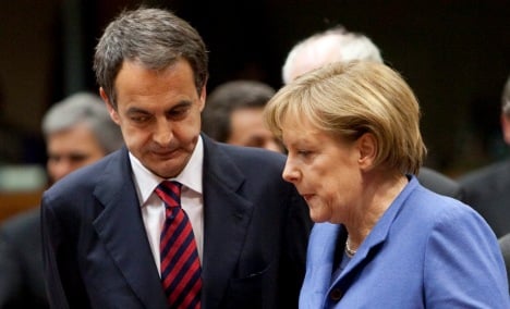 Merkel lauds Spain's reforms amid bailout talk