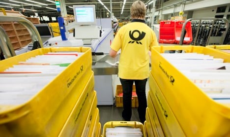 German post considers raising postage charges