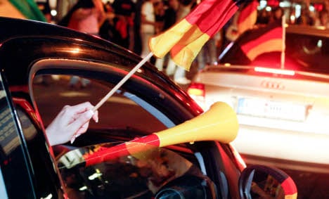 Drunk football fan beats police officer with vuvuzela