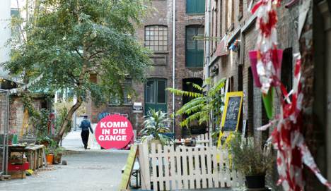 Hamburg artists celebrate success in saving squatted quarter