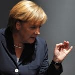 Merkel calls for global financial market tax
