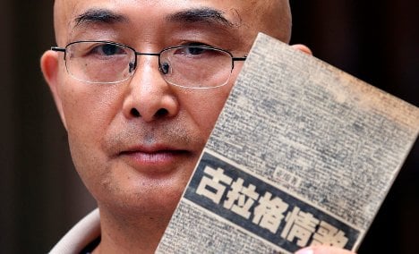 Dissident Chinese author says persistence beat travel ban