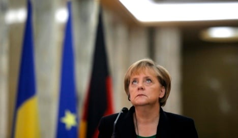 Poll shows Merkel's coalition at all-time low