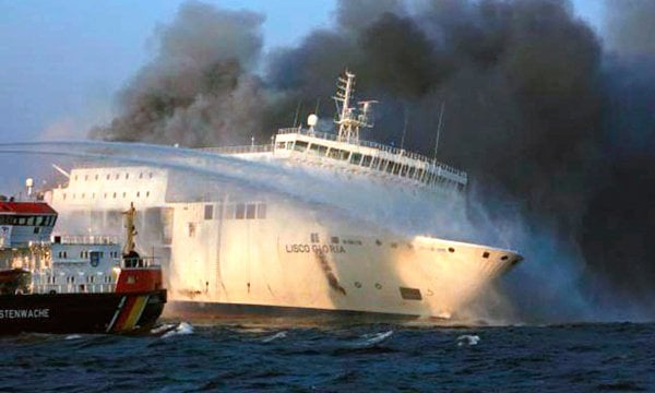 Fire fighters cannot put too much water onto the burning ferry for fear it could sinkPhoto: DPA