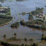 Eastern floodwaters ease but alert remains high