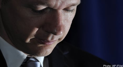 Sweden issues global warrant for Assange