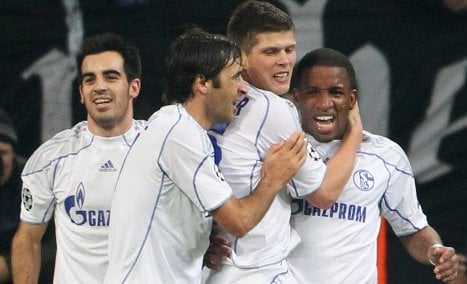 Schalke makes last 16 in Champions League with win over Lyon