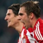 Lahm says Bayern not yet out of title race