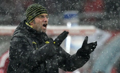 Dortmund dismisses title talk as Bayern tries to regain form