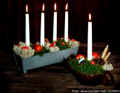Swedes turn to candles to thwart the darkness