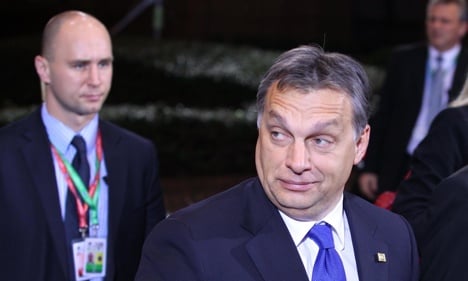 Hungary defies Merkel's criticism of new press laws