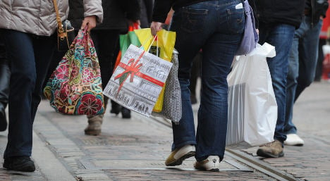 Upbeat retailers push business confidence to record high