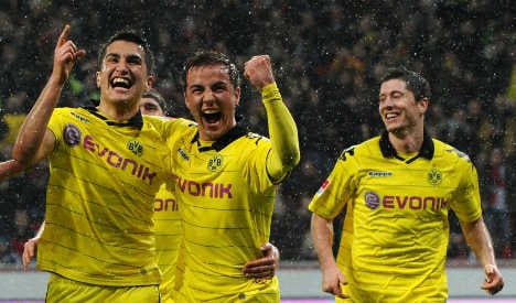 Dortmund extends league lead to 13 points