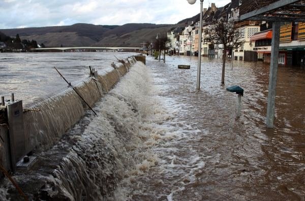 Waters of the Mosel river breaching the banks at Zell, Rhineland-Palatinate, on Friday. Photo: DPA